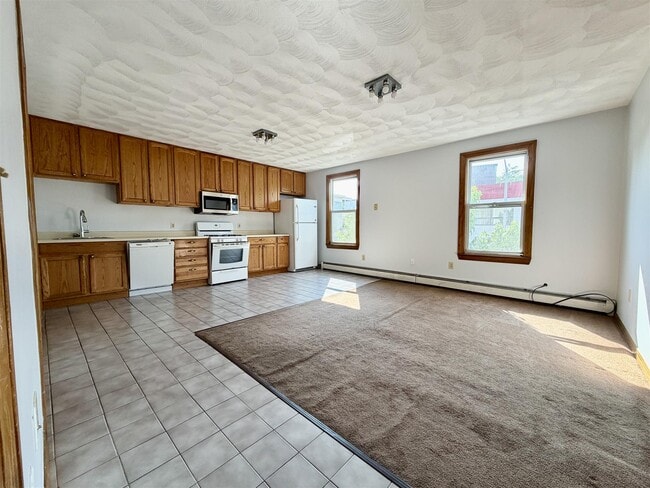 Building Photo - 1236 Cambridge St Unit 2R