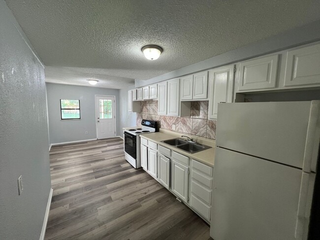 Photo - Spacious 3BR/1BA with Huge Yard & Charming...