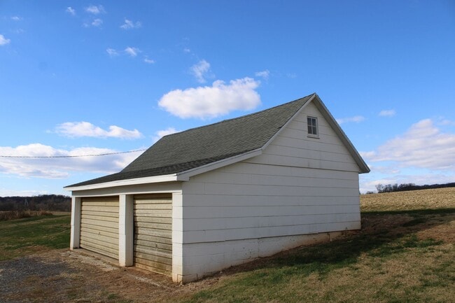 Photo - Country Charm in this 2.5 Story Farmhouse