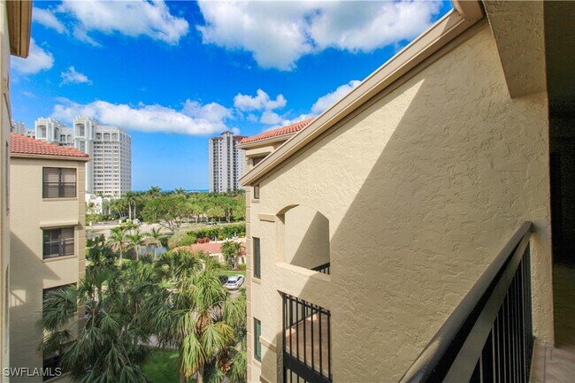 Building Photo - 7024 Pelican Bay Blvd Unit F-504
