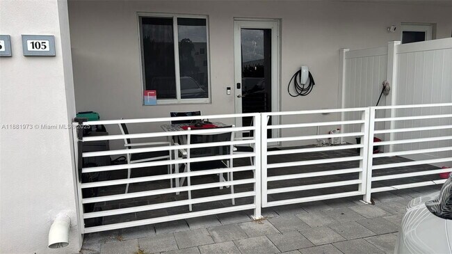 Building Photo - 6455 NW 103rd Pl Unit 105