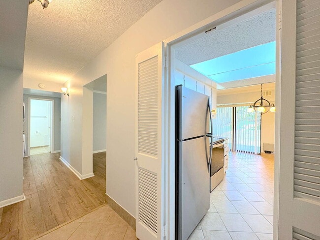 Photo - Welcome to this beautifully maintained first-floor condominium offering 2 bedrooms and 2 full bat... Unidad 1B