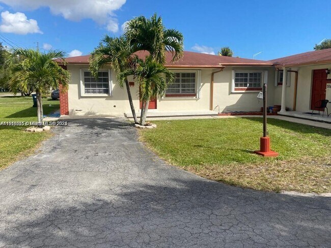 Building Photo - 7880 Grand Canal Dr Unit 1