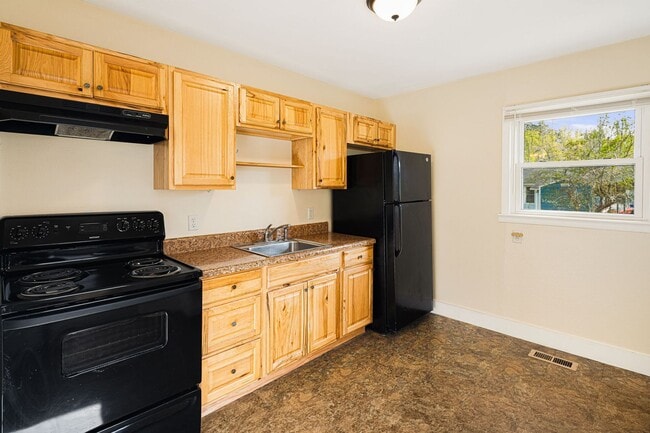 Photo - Sunny 2-Bedroom Home in Roosevelt Park | Fenced Yard + Basement