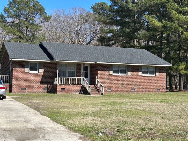 Building Photo - Three bedroom two bath home for rent in Ta...