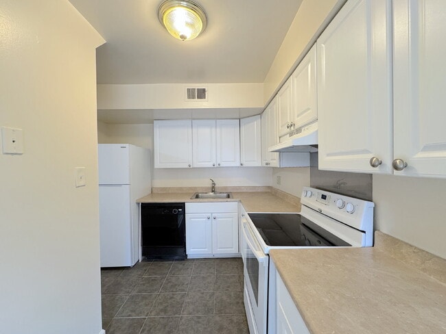 Photo - Welcome to this charming 2-bedroom, 2-bathroom townhouse nestled in the heart of Annandale.