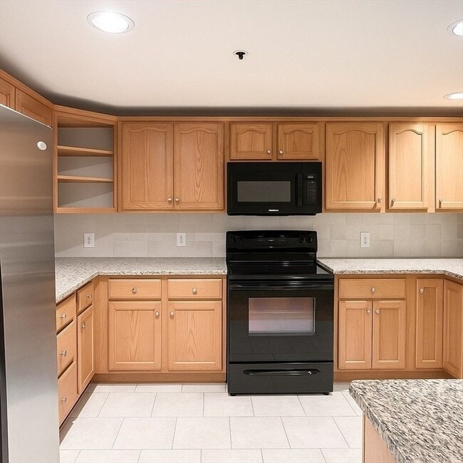 Photo - Updated 2BR / 2BA Condo with Private Deck & In-Unit Laundry at Academy Park Unit 306