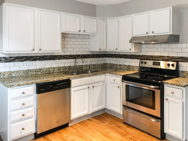 Building Photo - 2445 Lawrence St Unit C