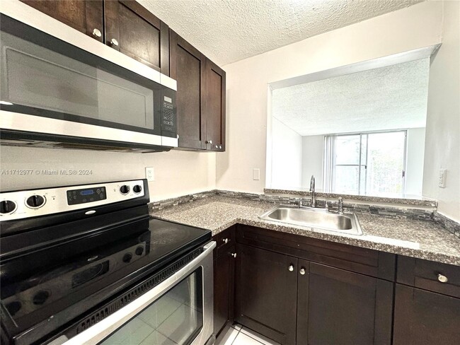 Photo - 484 NW 165th St Condo Unit A-411