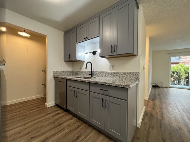 Photo - Updated 1BD Apartment Near Downtown with Balcony & Modern Kitchen Updates off street parking Unit 7721