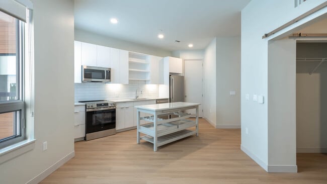 Kitchen with Stainless Steel Appliances - The Basin