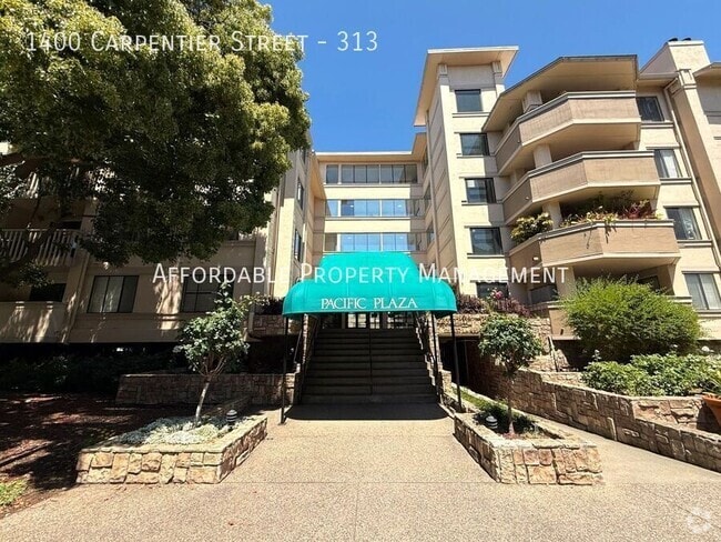Building Photo - 1400 Carpentier St Unit 313 Rental