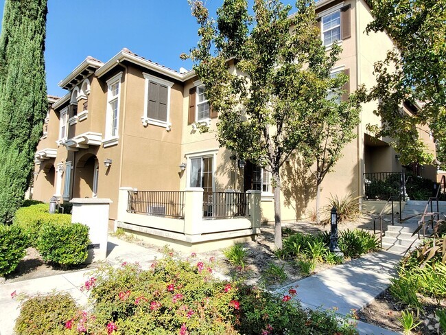 Building Photo - Spacious 2-Story Luxury Condo in Communica...