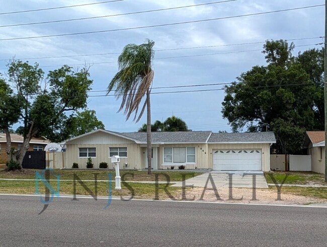 Photo - Beautiful 4/2/2 home with a POOL, 1700 Sq. Ft. with fenced yard, TONS of renovations