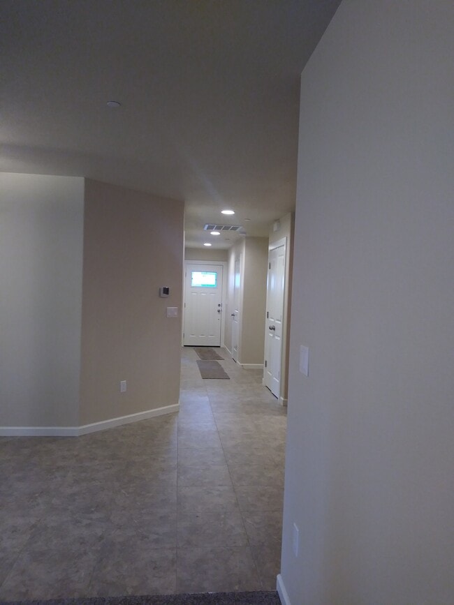 Hallway from the kitchen to front door - 713 E Main St