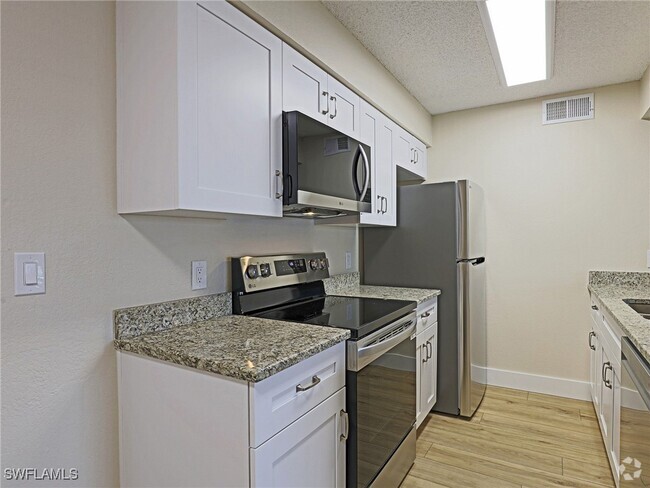 Building Photo - 5311 Summerlin Rd Unit 1112 Rental