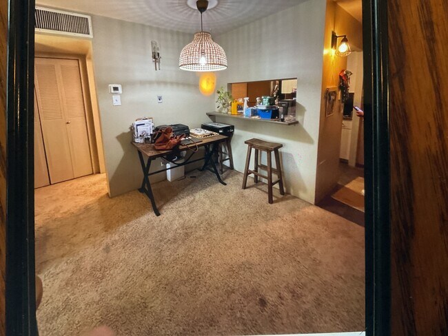 Looking at kitchen from dinning area - 400 S Lafayette St Unit Park Lafayette Condominiu