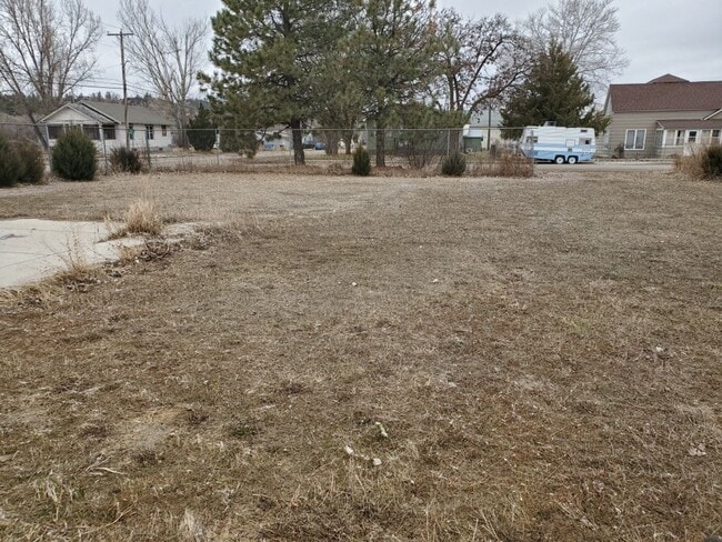 Photo - Small Living with Large Garage