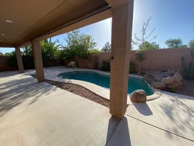 Photo - Prime Power Ranch Retreat: 4BR/2.5BA Oasis with Private Pool, Vaulted Ceilings & Backyard Bliss!