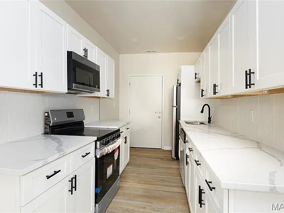 Building Photo - 5909 Cates Ave Unit 2E