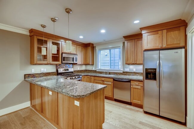 Photo - Immaculate 5 bedroom townhome available for instant move-in.