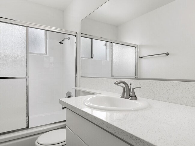 Modern styled bathroom with shower and tub.