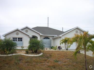 Building Photo - Spacious and Well-Maintained 4-Bedroom Hom... Rental