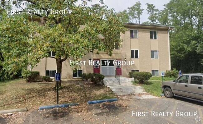 Building Photo - 5620 N Main St Unit Apt. 201