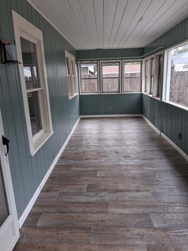 Enclosed porch at front entrance - 51 McEwen Rd