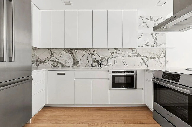 Photo - "Luxury 1-Bedroom Oasis with Pool & Elegant Finishes in Prime New York Location!"