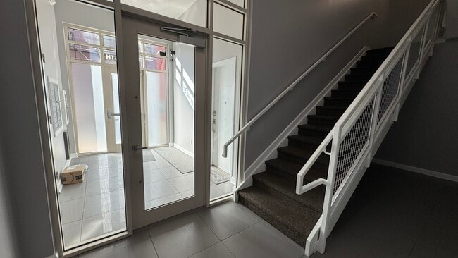 Secure area for package delivery and mail. - 116 W 15th St Unit 303