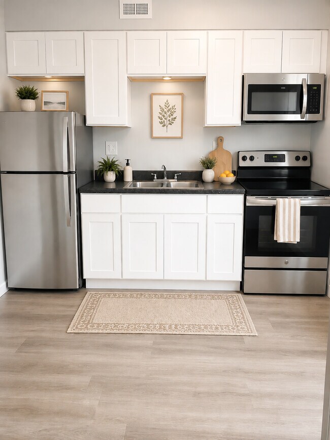 A charming kitchen designed to make everyday meals feel effortless. - Watkins Manor