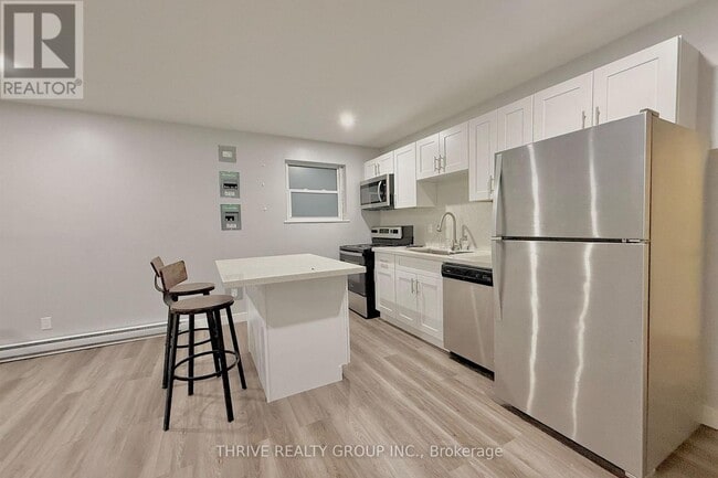 Photo - 100 King Edward Ave Unité 7