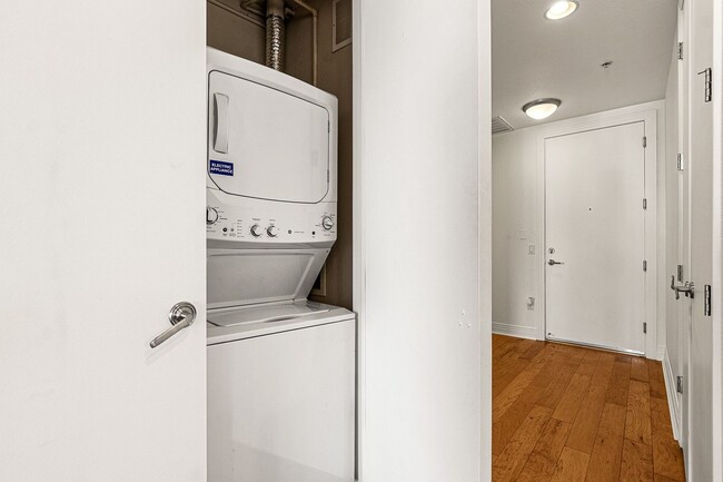 Building Photo - Fantastic Condo With Central AC And 1 Reserved Garage Parking Space!