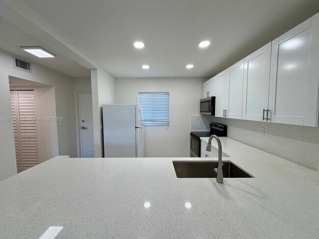 Photo - 7730 Camino Real Unit F 406