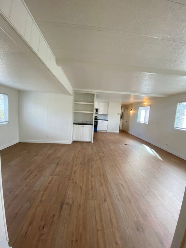 Photo - Beautifully just Remodeled-Spacious 3 bedrooms, 2 full baths mobile home with fenced yard. storag...