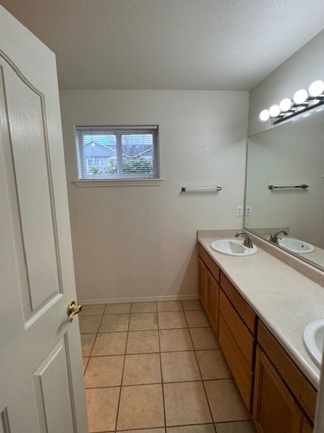 Photo - COMING SOON !!  DUPLEX CENTRALLY LOCATED W/ DOUBLE CAR GARAGE AND FENCED YARD