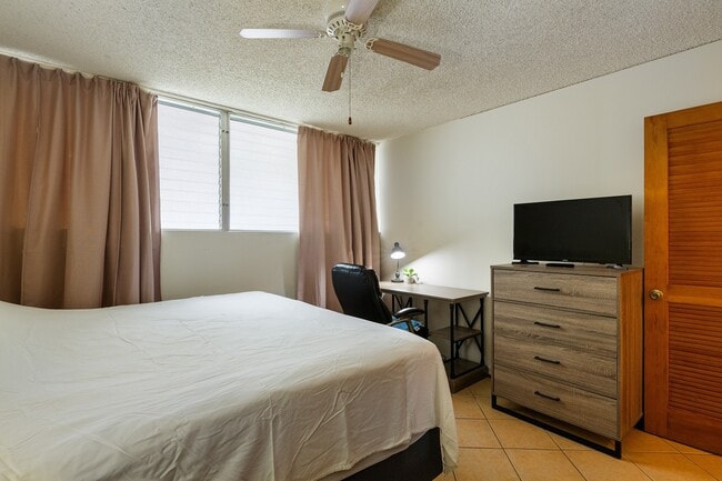 Photo - Furnished 1 Bed 1 Bath Condo. Includes Electric, Water, Sewer & Gas. Ample unassigned parking. Unit 205
