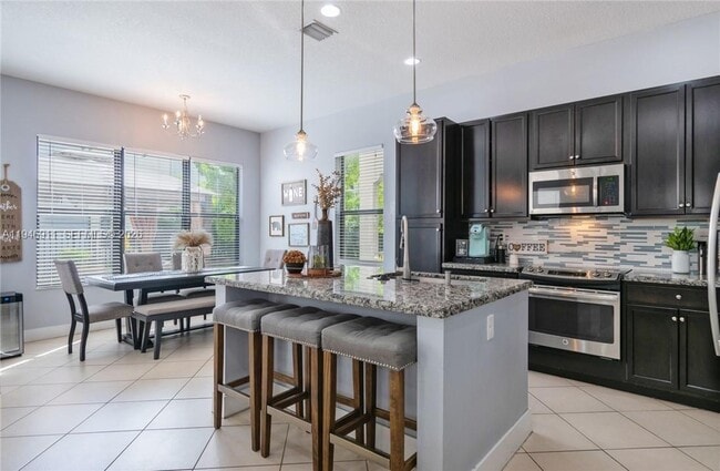 Photo - 9865 W 34th Ct