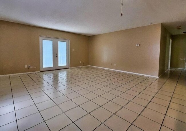 Photo - Charming 3-Bedroom Home with Pool, 2-Car Garage, and Tile Flooring Throughout!