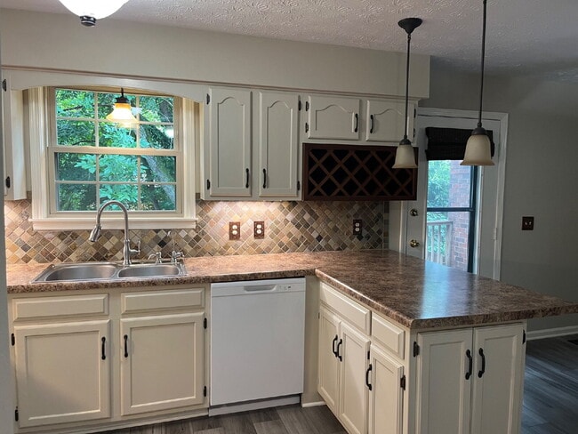 Photo - "Charming 2-Bed, 2.5-Bath Townhouse Retreat in Nashville - 1,242 Sq. Ft. of Comfort!"
Lawn Care I...