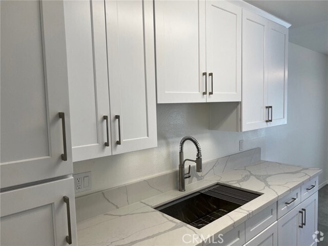 Building Photo - 7039 Remmet Ave Unit I Rental