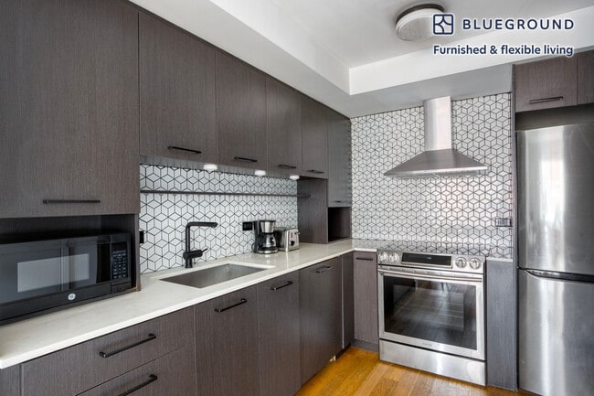 101 E 10th St Unit SI FL4-ID1182