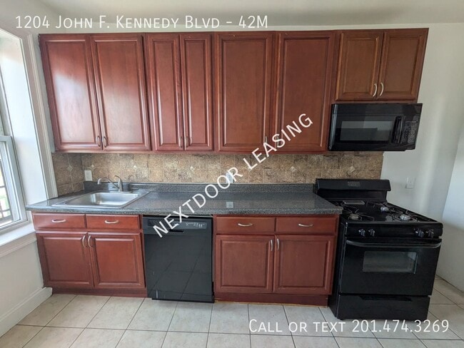 Building Photo - 1204 John F. Kennedy Blvd Unit 42M