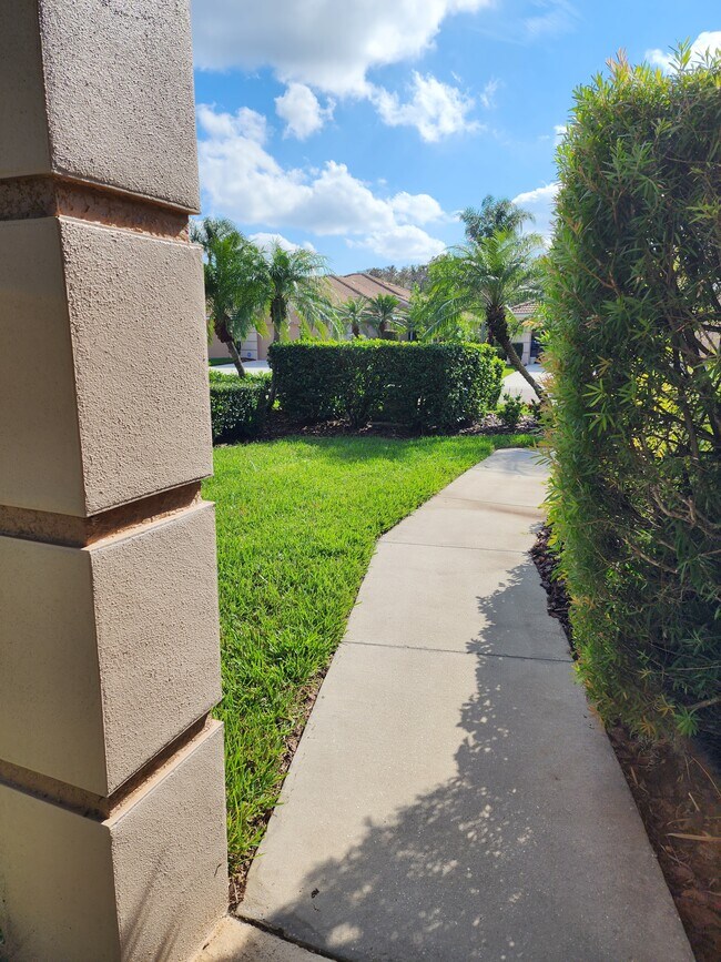 Front Walkway - 8323 Eagle Isles Pl