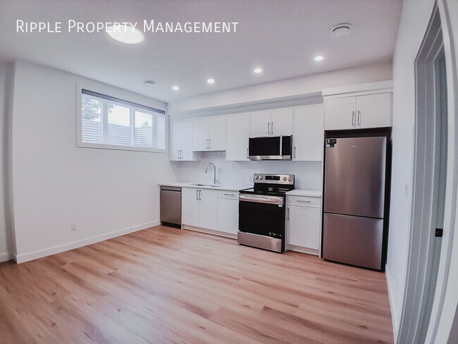 Photo - SPACIOUS 1 BEDS, 1 BATHS LOWER SUITE | PRIVATE REAR ENTRY & ABUNDANT NATURAL LIGHT