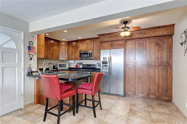 New Kitchen with Stainless Appliances - 34264 Camino Capistrano Condo Unit 210