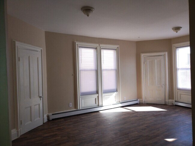 Living room. Two closets in picture - 17 LINDEN St Unit FL2