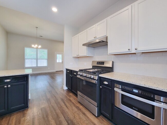 Photo - Very functional floor plan, has game room/home office, covered back patio on a big lot. Primary o...