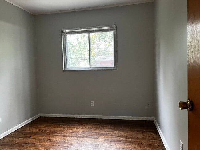 Photo - 3 BR 1.5 BA split-level with attached 1 car garage